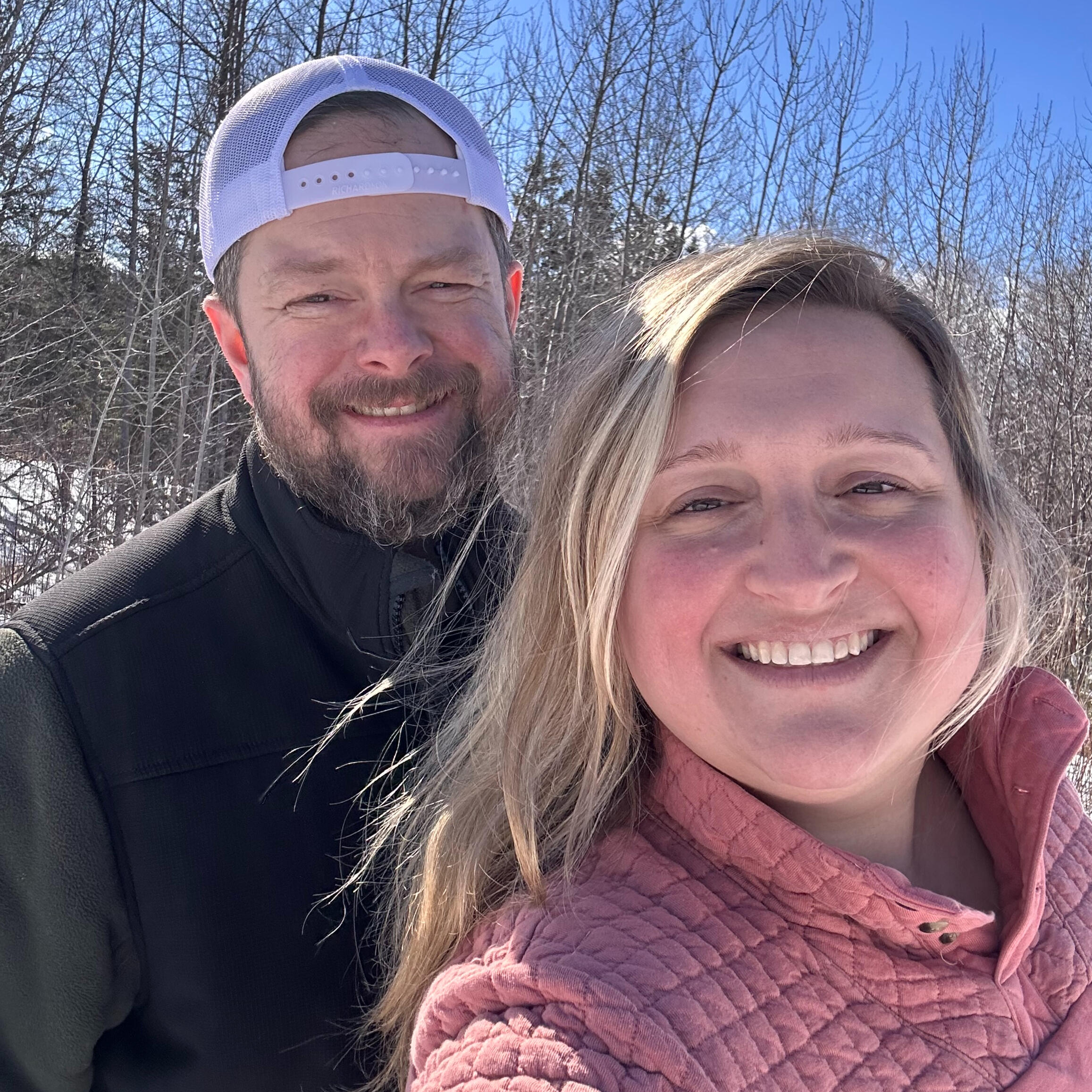 Hannah Schoneberger and her husband outdoors in winter at their house in Esko